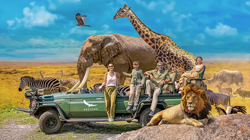 The Lockwood family sitting on a safari jeep, surrounded by animals