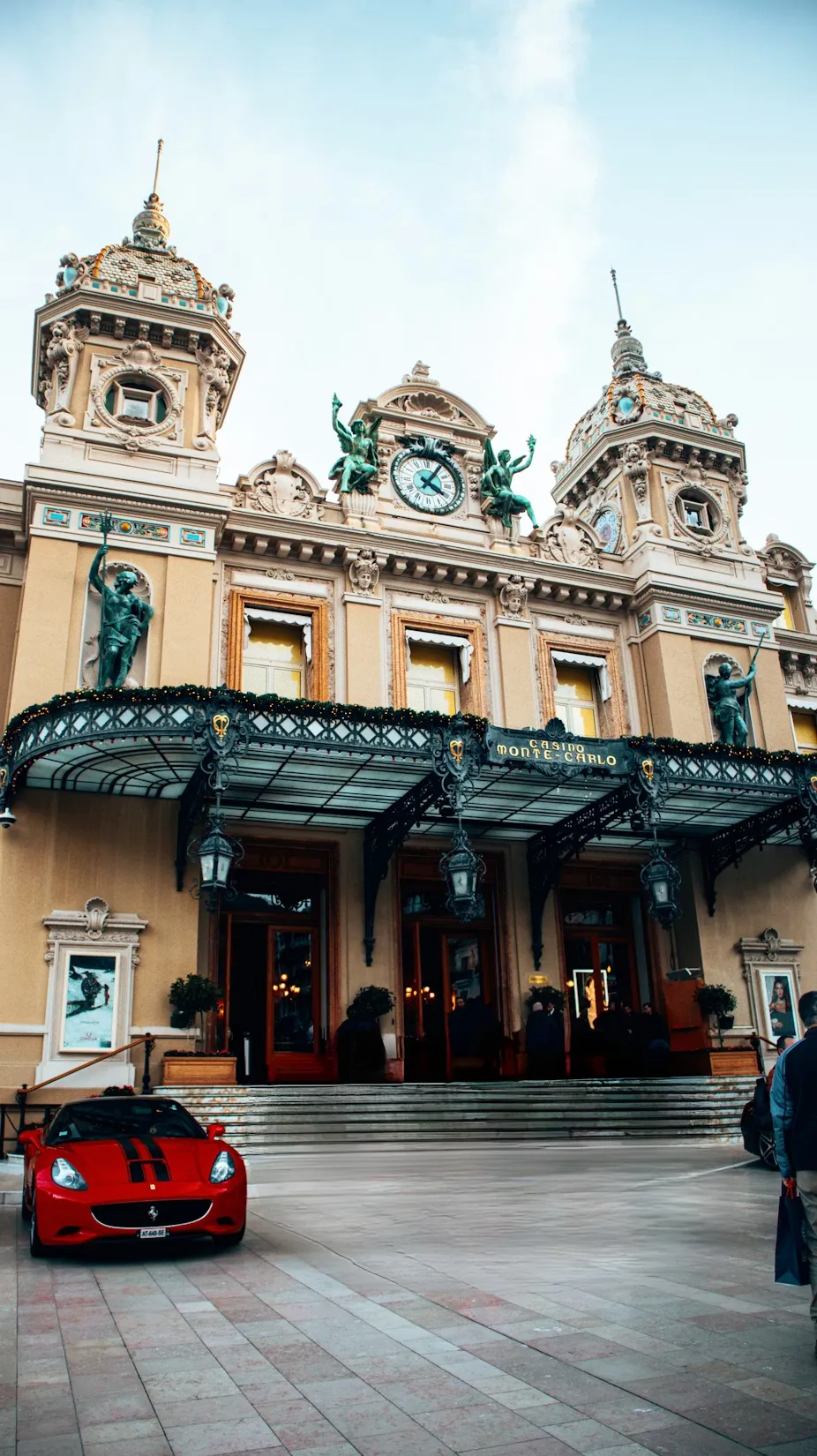 A Ferrari parked outside a hotel in Monte Carlo