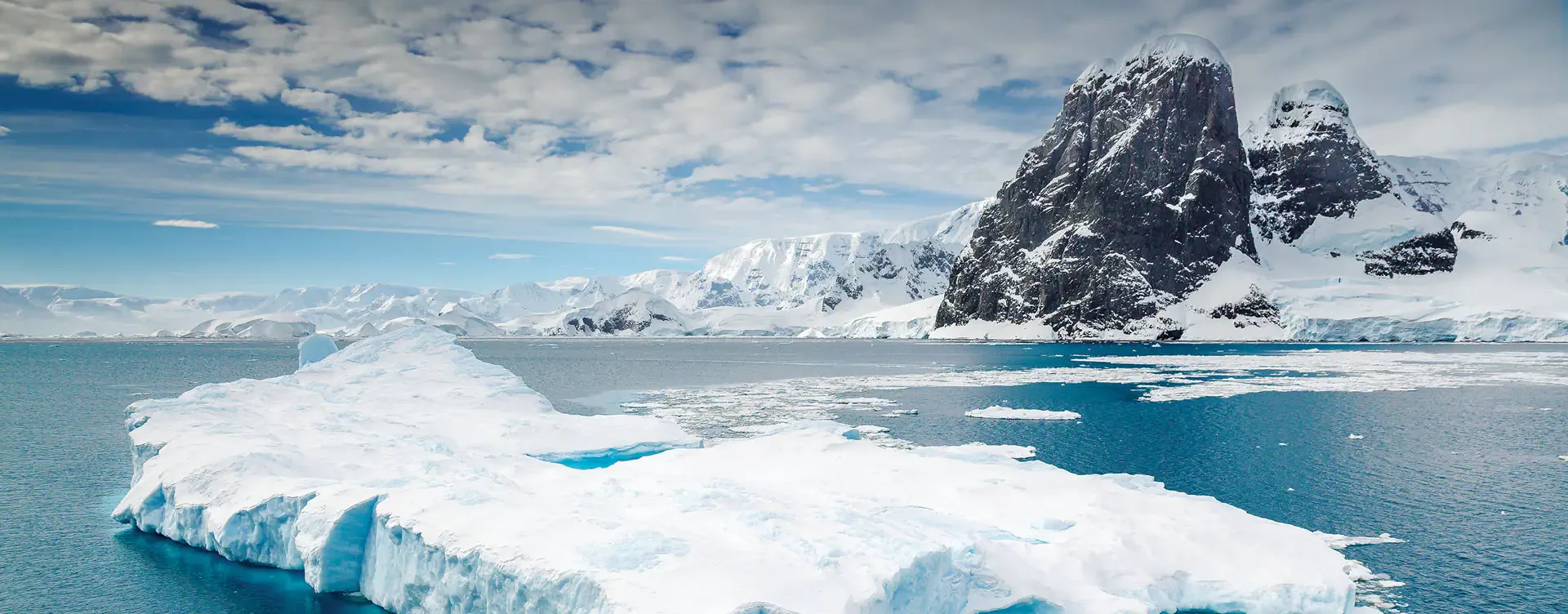 Arctic mountains and iceburgs