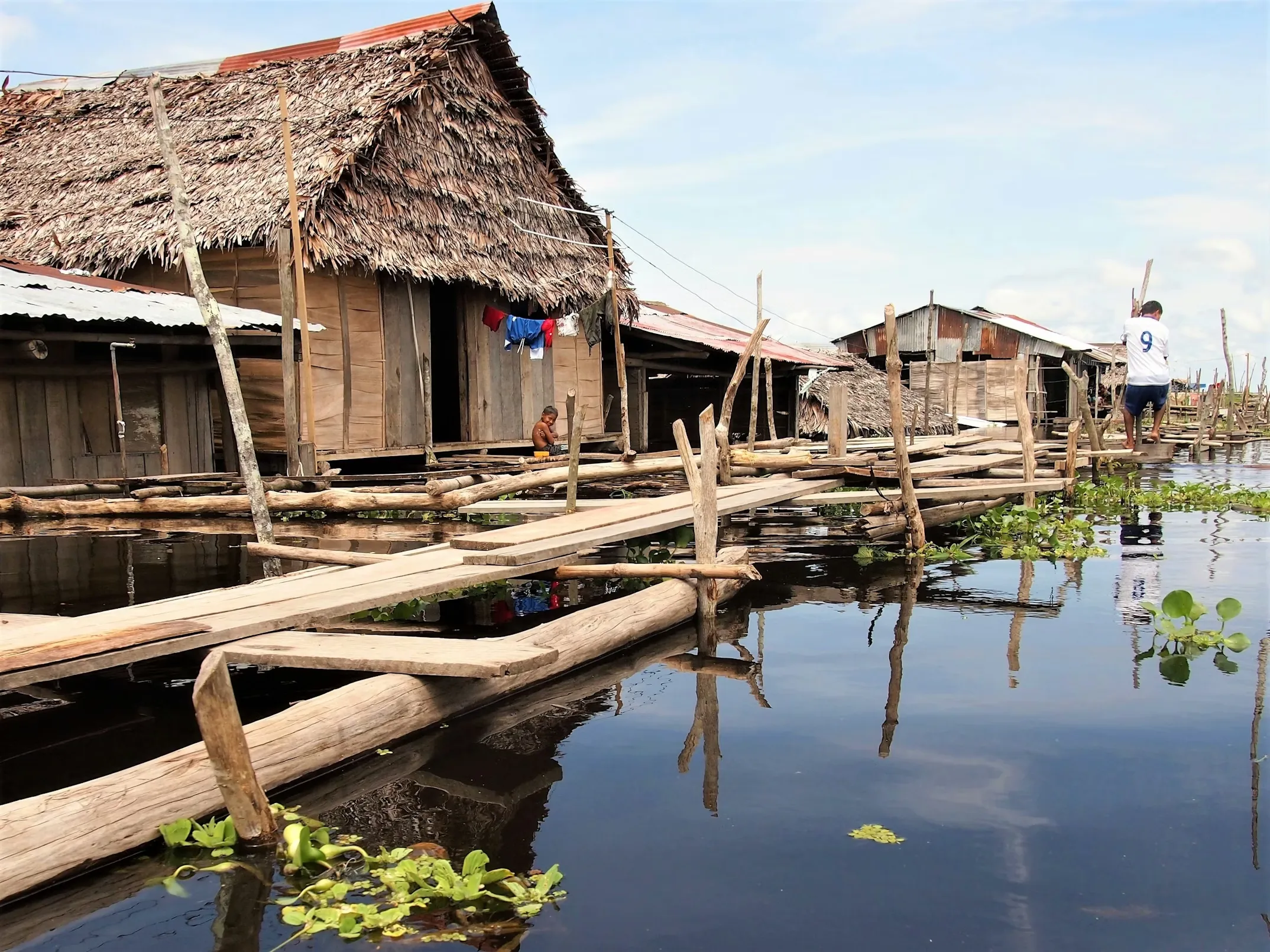 A village along the river in Iquitos, Peru