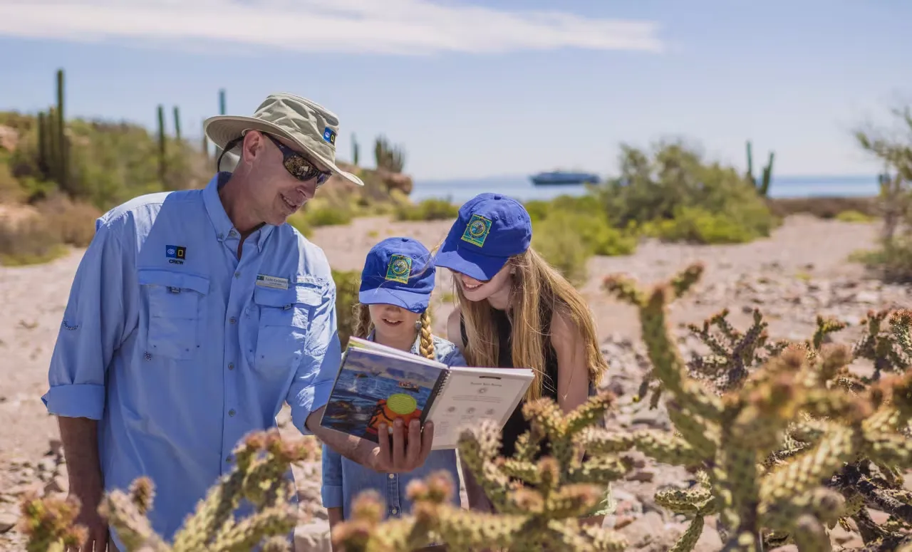 Aft loading of zodiacs on a NatGeo-Lindblad expedition guide with guests