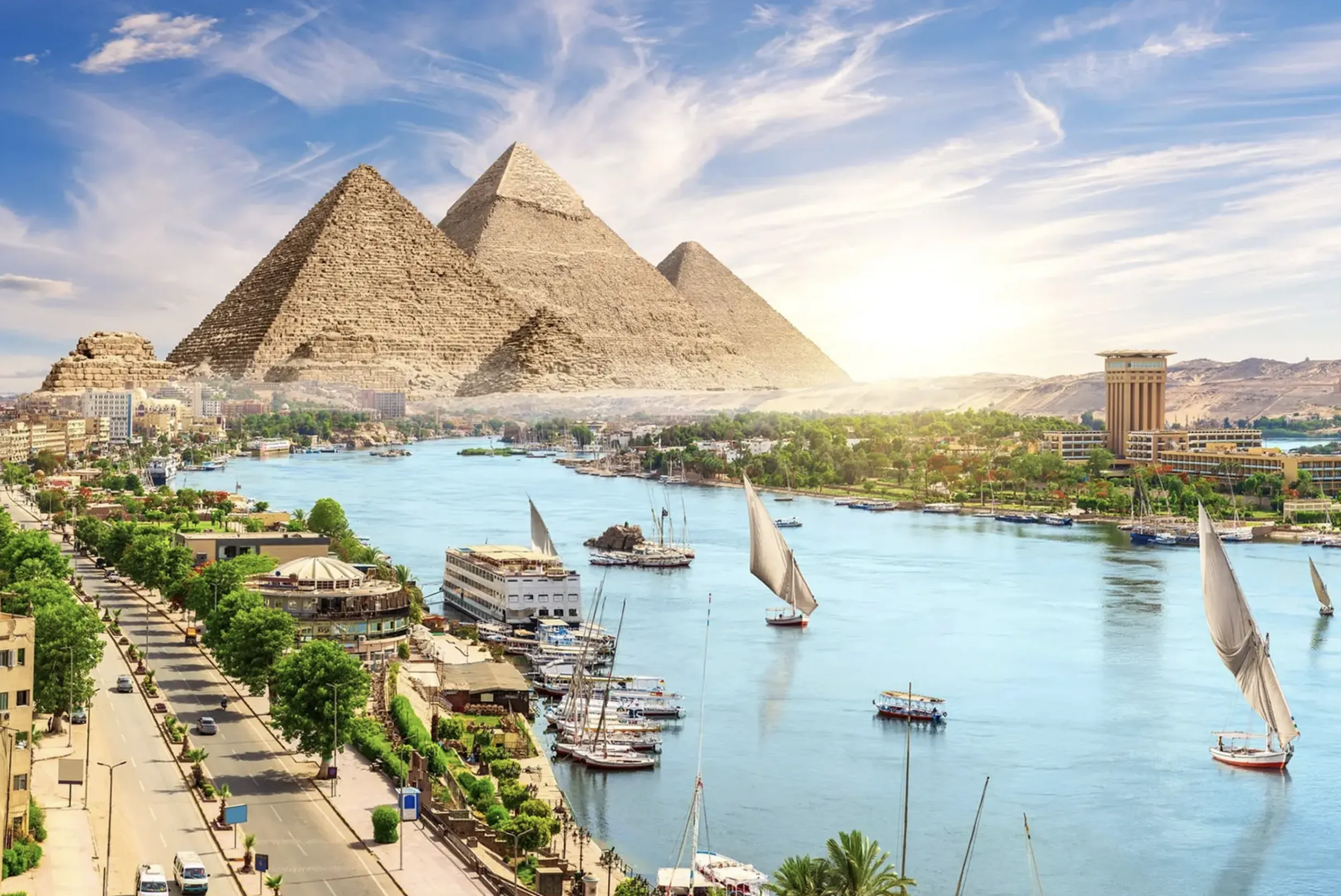 The Nile river with pyramids in the background