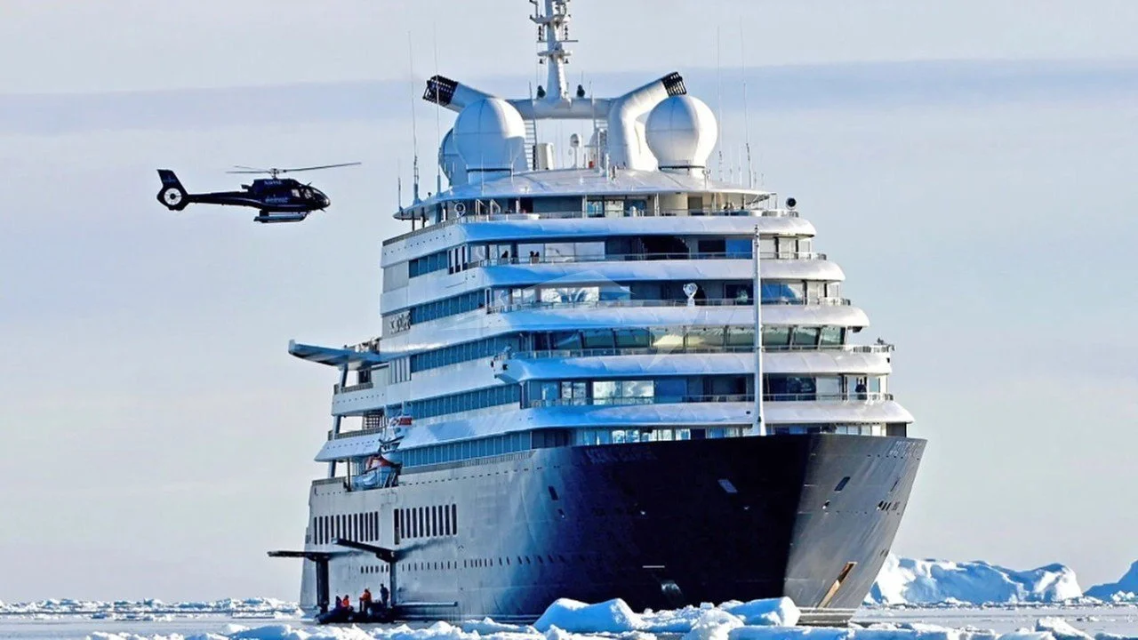 The Scenic Eclipse luxury yacht with a helicopter landing on its deck