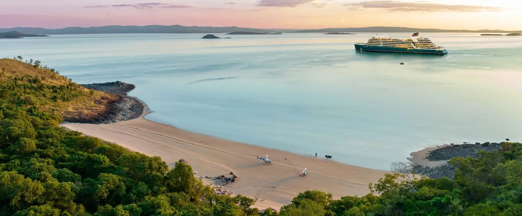 A Seabourn expedition cruise ship sits at anchor of the Kimberley coast of Australia