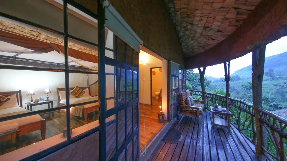 A mahogany lodge deck overlooking mountain valley