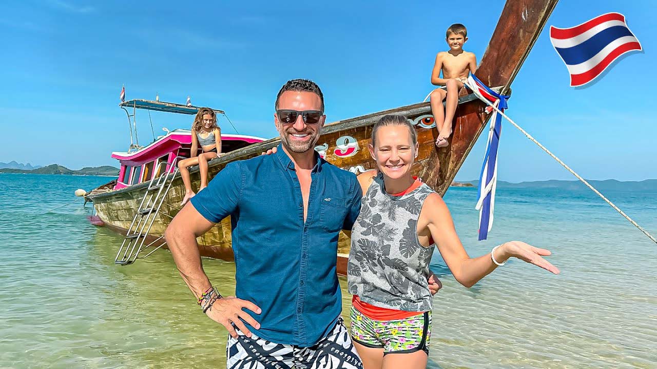 The Lockwood family with a boat in Phuket, Thailand