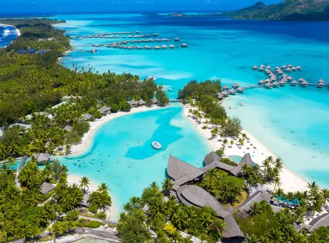 Aerial view of a turquoise lagoon in Bora Bora