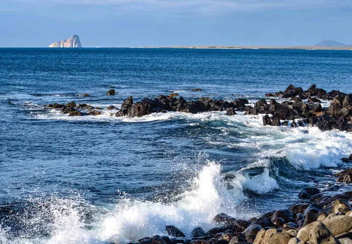 waves splashing against a rocky beach