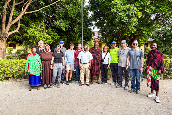 Visitors pose at The O’Brien School for the Massai