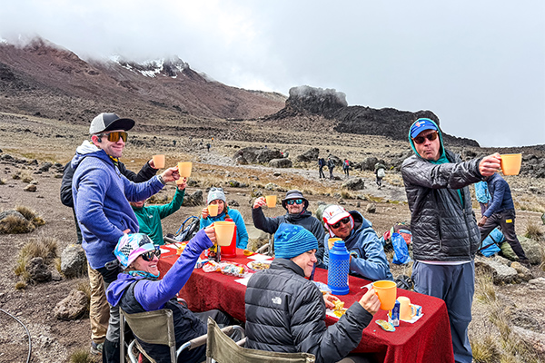 Hikers take a picnic break on Kilimanjaro