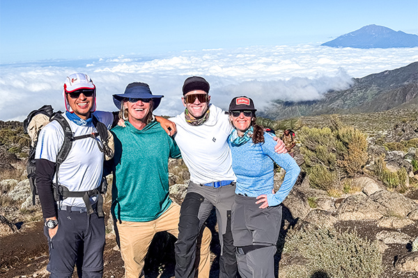 Hikers pose on Kilimanjaro