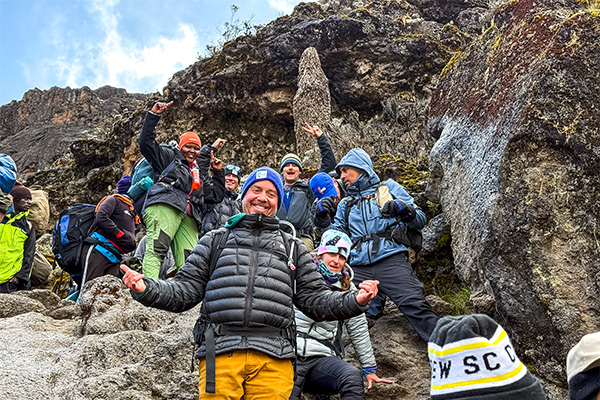 Hikers pose on Kilimanjaro