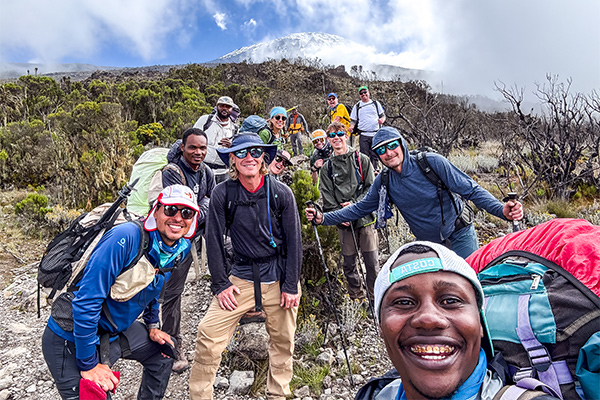 Hikers pose near the summit on Kilimanjaro