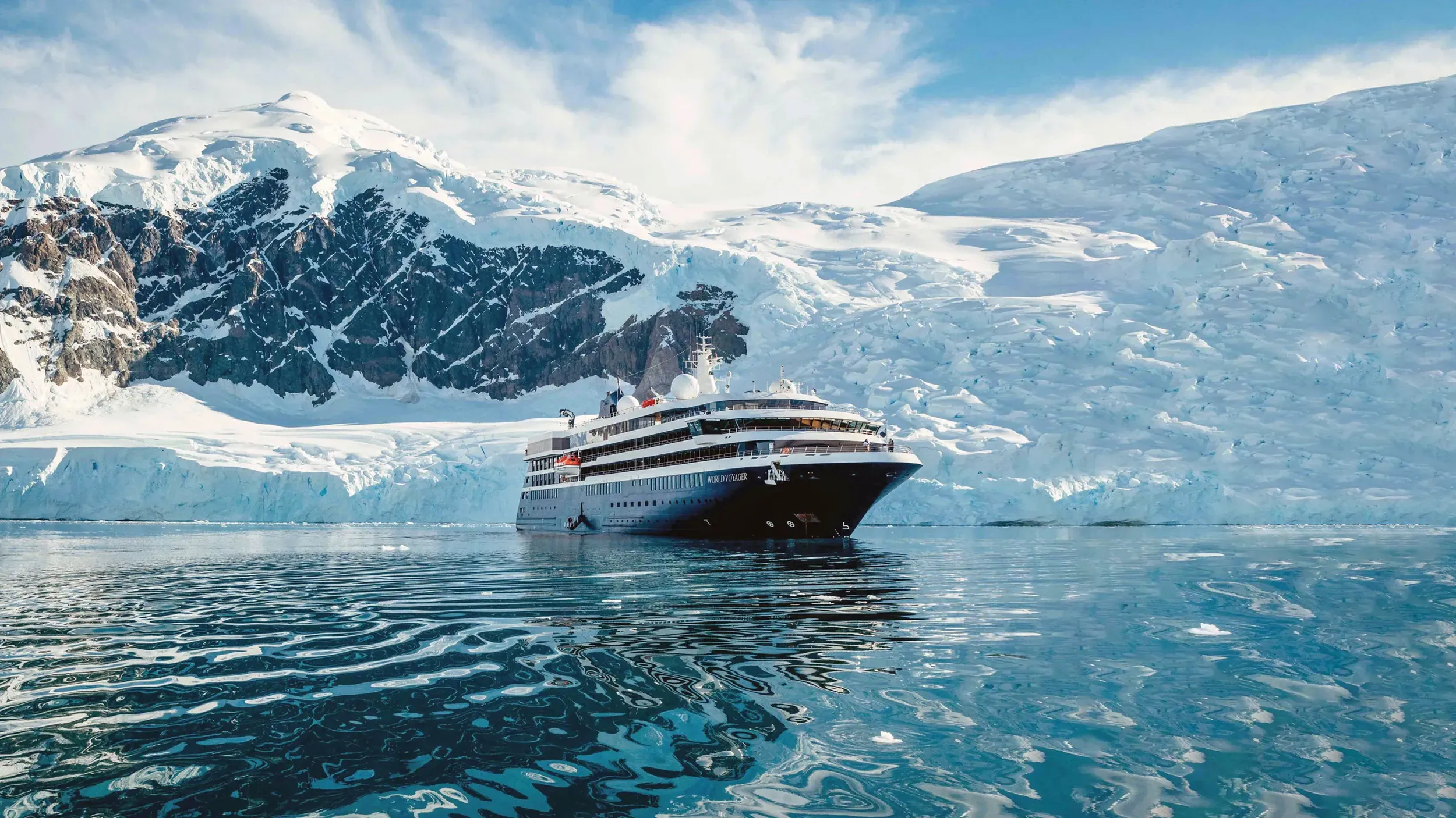 An Atlas Ocean Voyages cruise ship in Antarctica