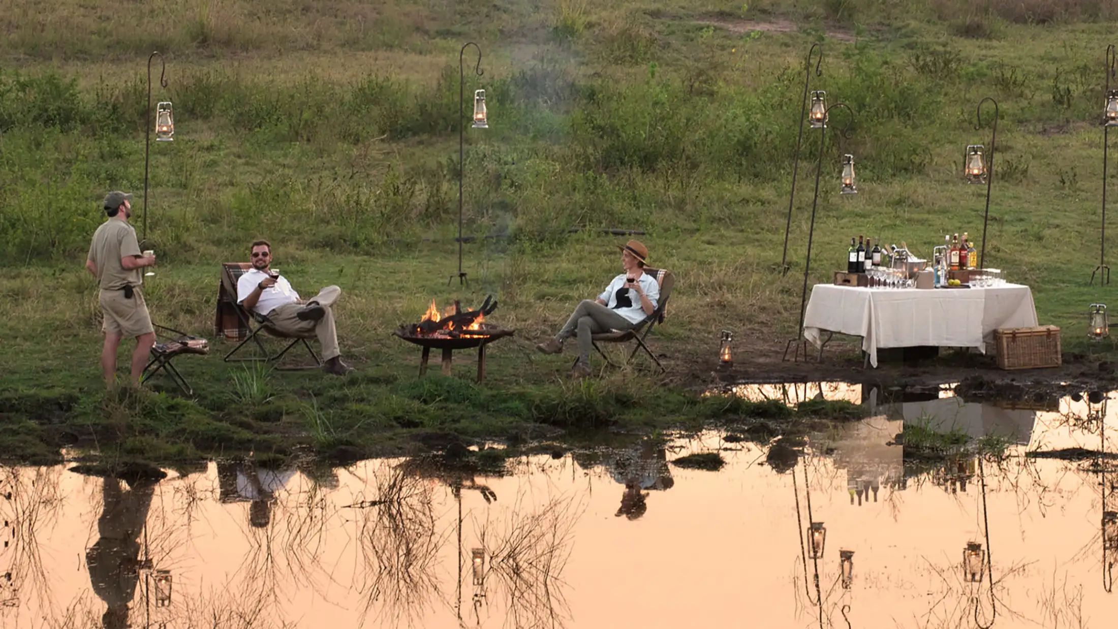 Guests enjoy a South African safari sundowner