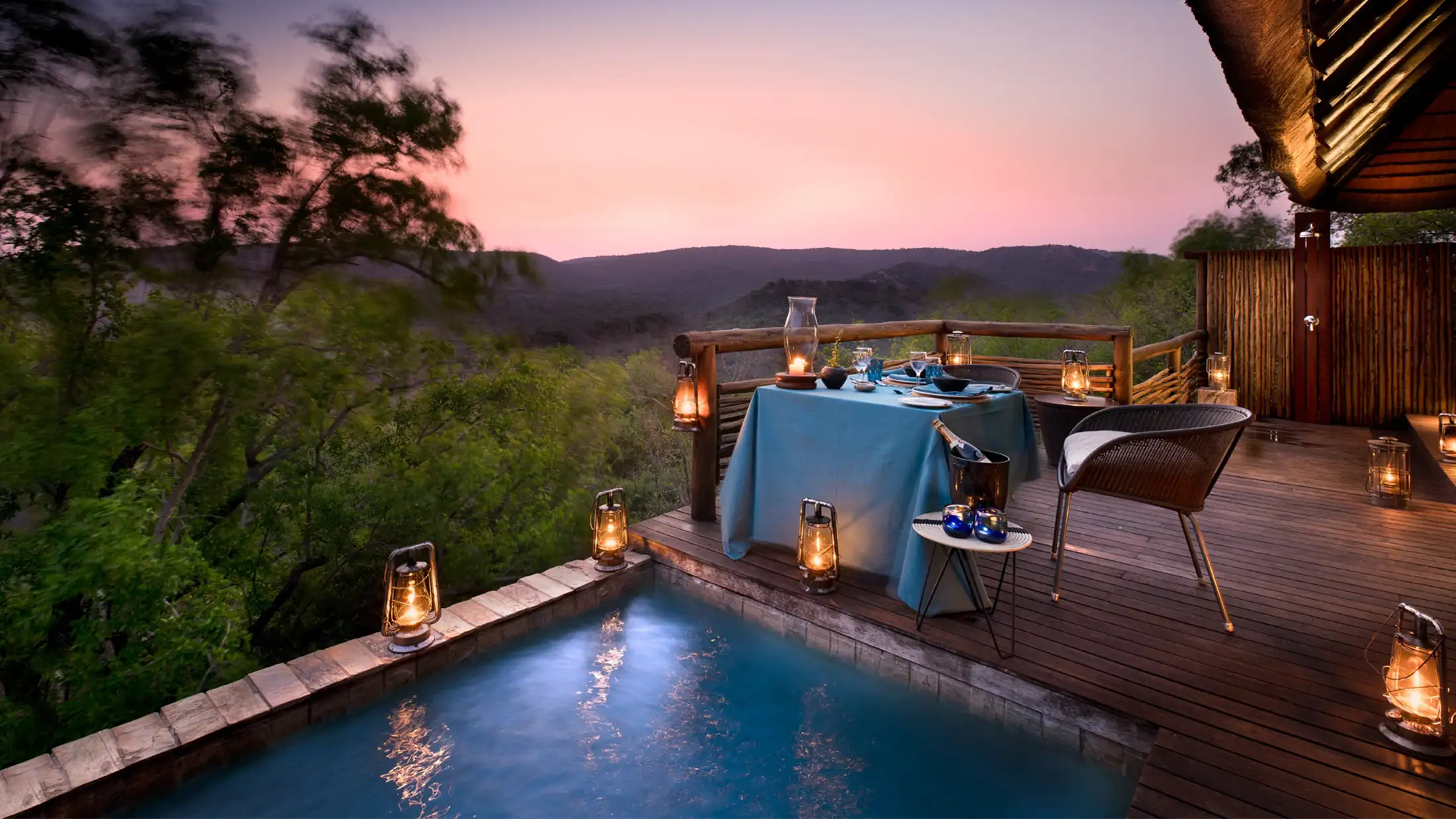 &Beyond Phinda Mountain Lodge pool and view at sunset