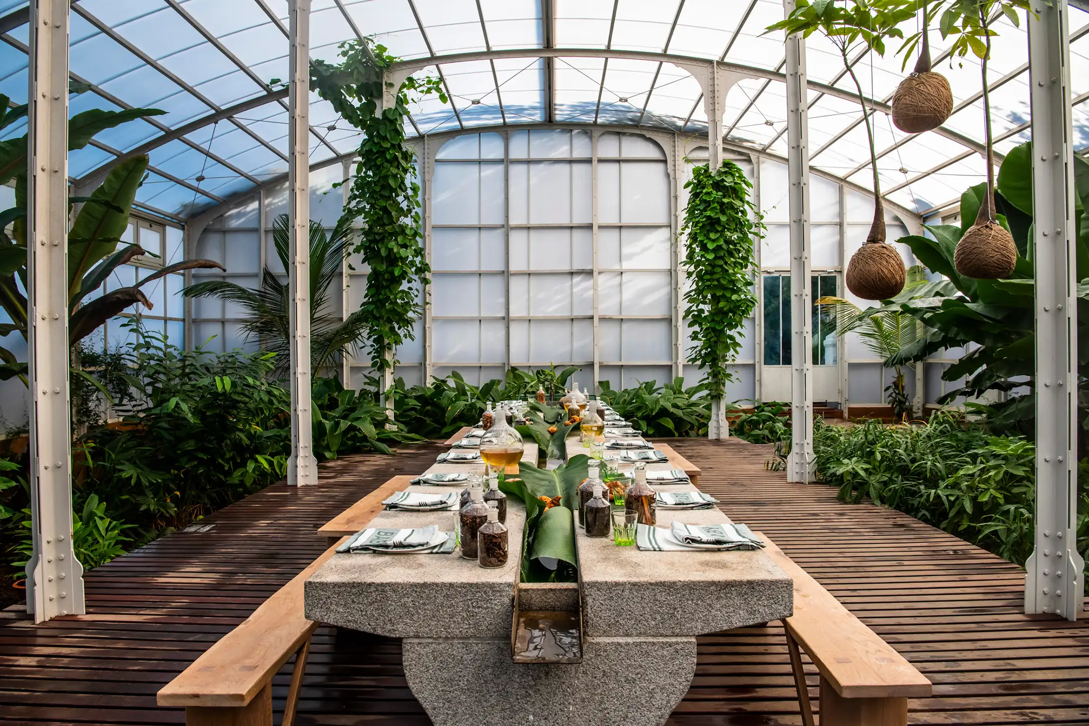 A dining table setup at Aerial mountain view of Babylonstoren in South Africa