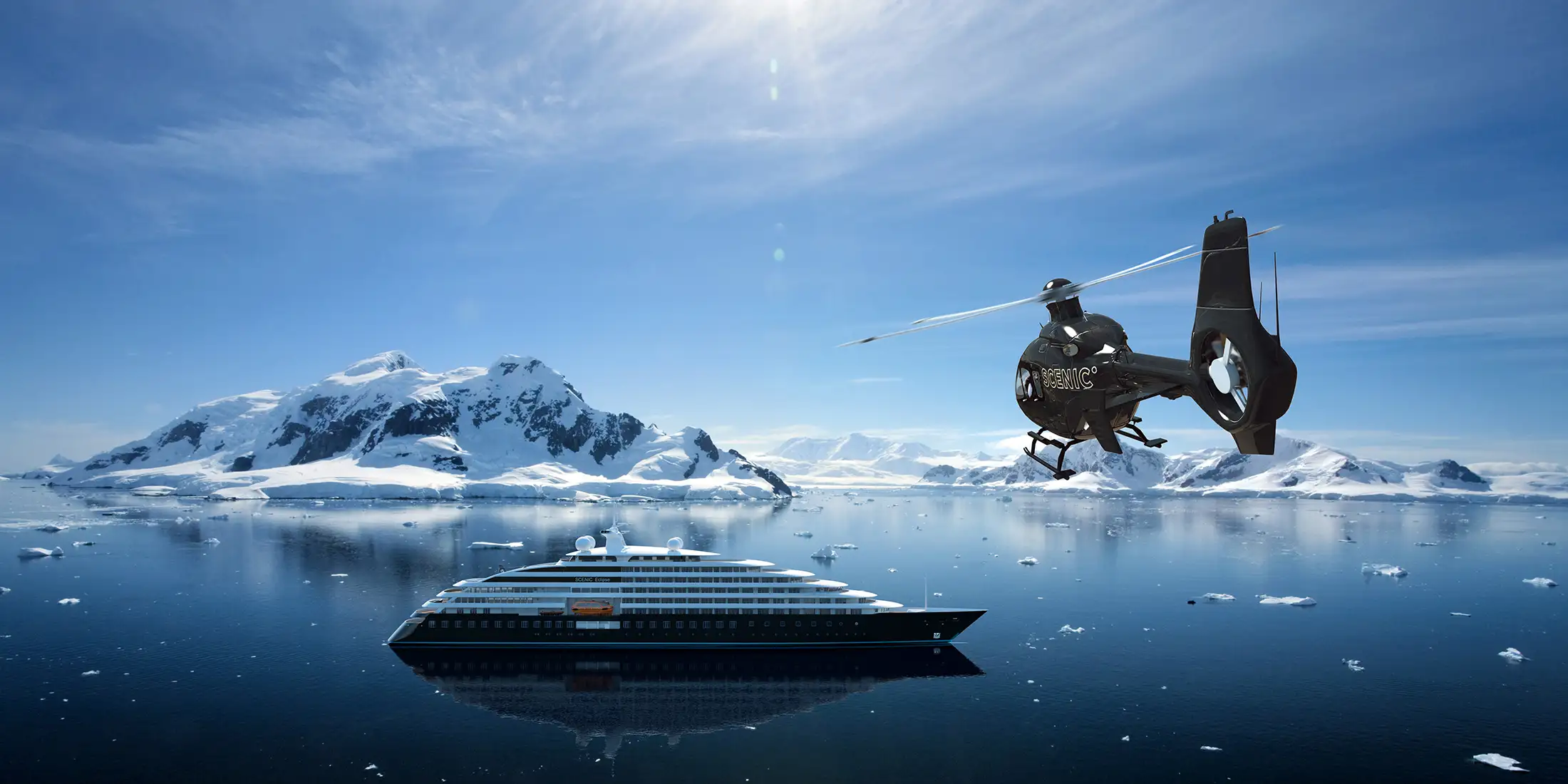A helicopter approaches the Scenic Eclipse super yacht