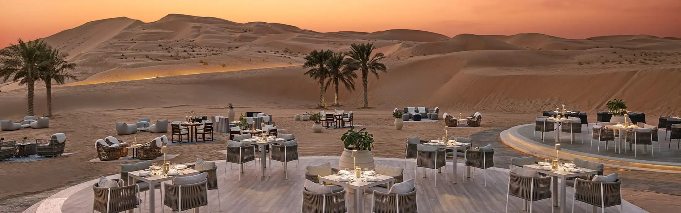 Outdoor dining setup at Qasr Al Sarab Resort & Spa