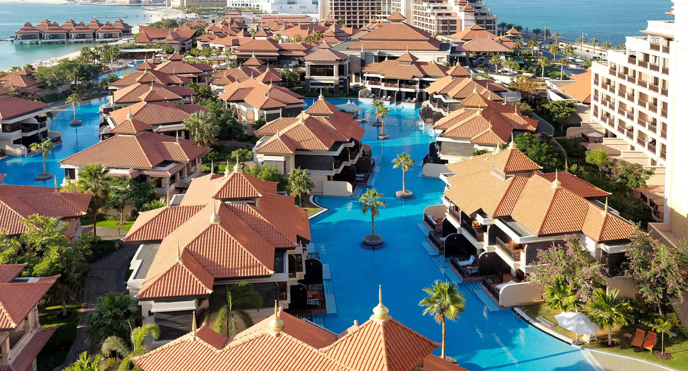 Aerial view of the pool area at Anantara The Palm Dubai