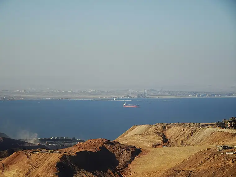 Far-off view of the Suez Canal from shore