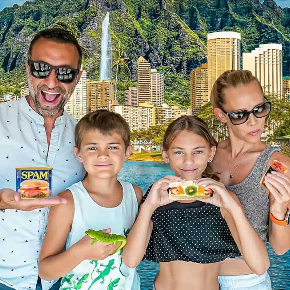 The Lockwood family holding Hawaiian treats in Oahu