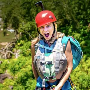 Erin Lockwood rappels a Maui waterfall