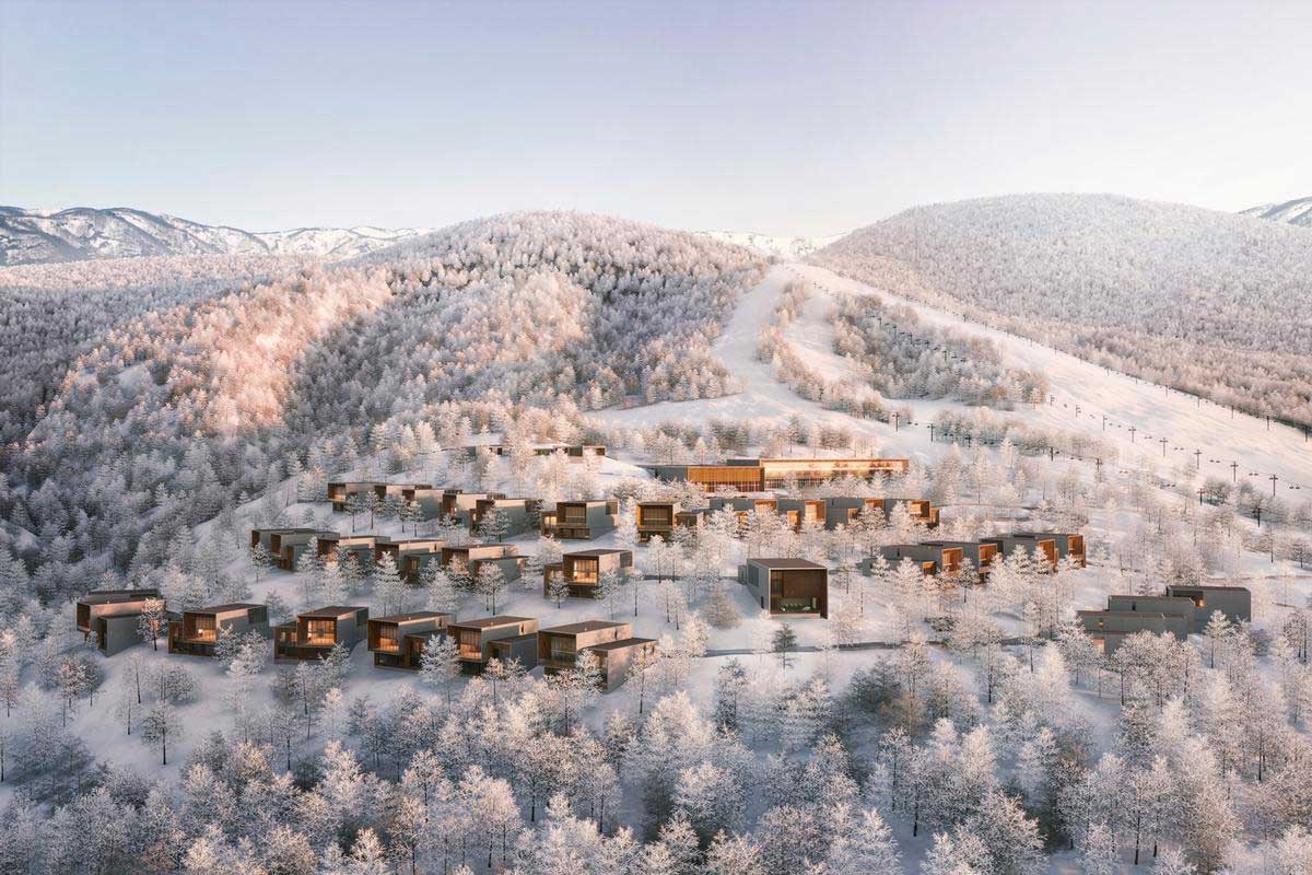 Aerial view of a snowy mountainside Aman resort