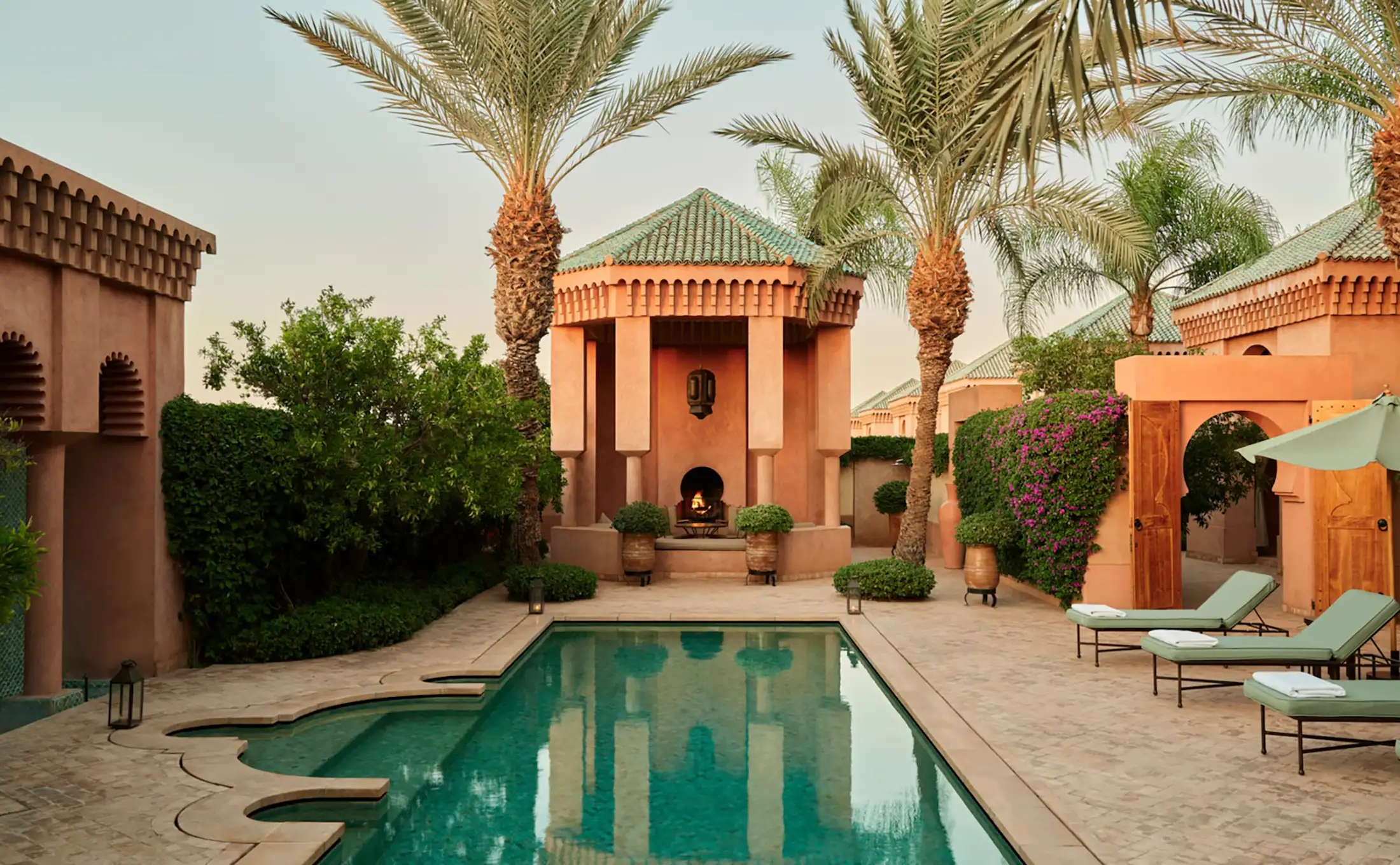 Aerial view of a pool area at an Aman resort