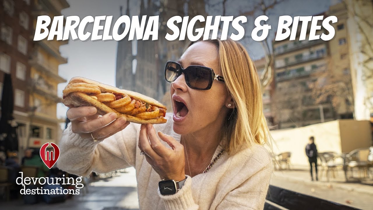 Erin Lockwood eating a massive sandwich in Barcelona