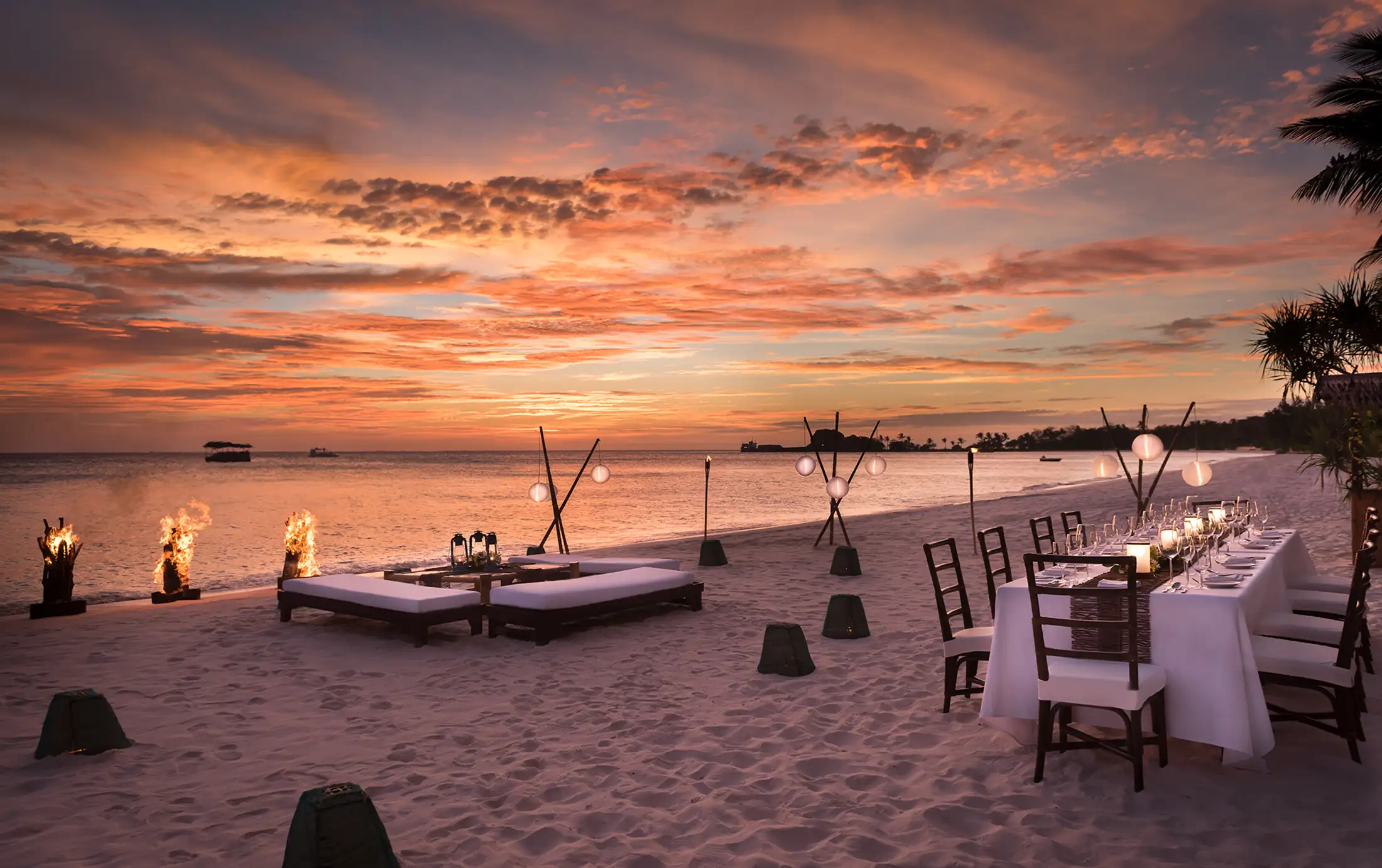 A beach dining setup at Amanpulo resort