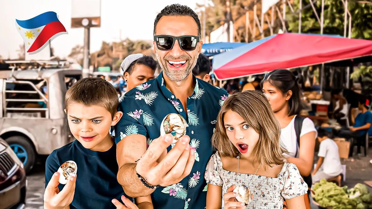 The Lockwood family holds up a balut egg in Cebu City