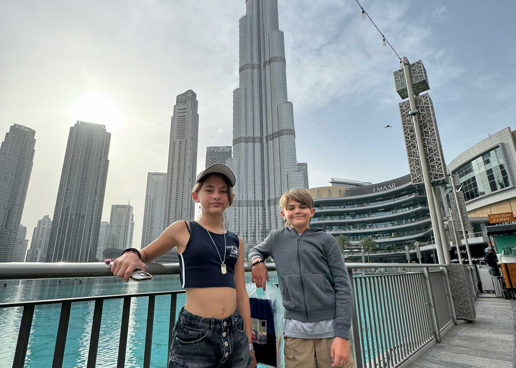 Brooklyn and Colt Lockwood stand in front of Burj Al Khalifa in Dubai