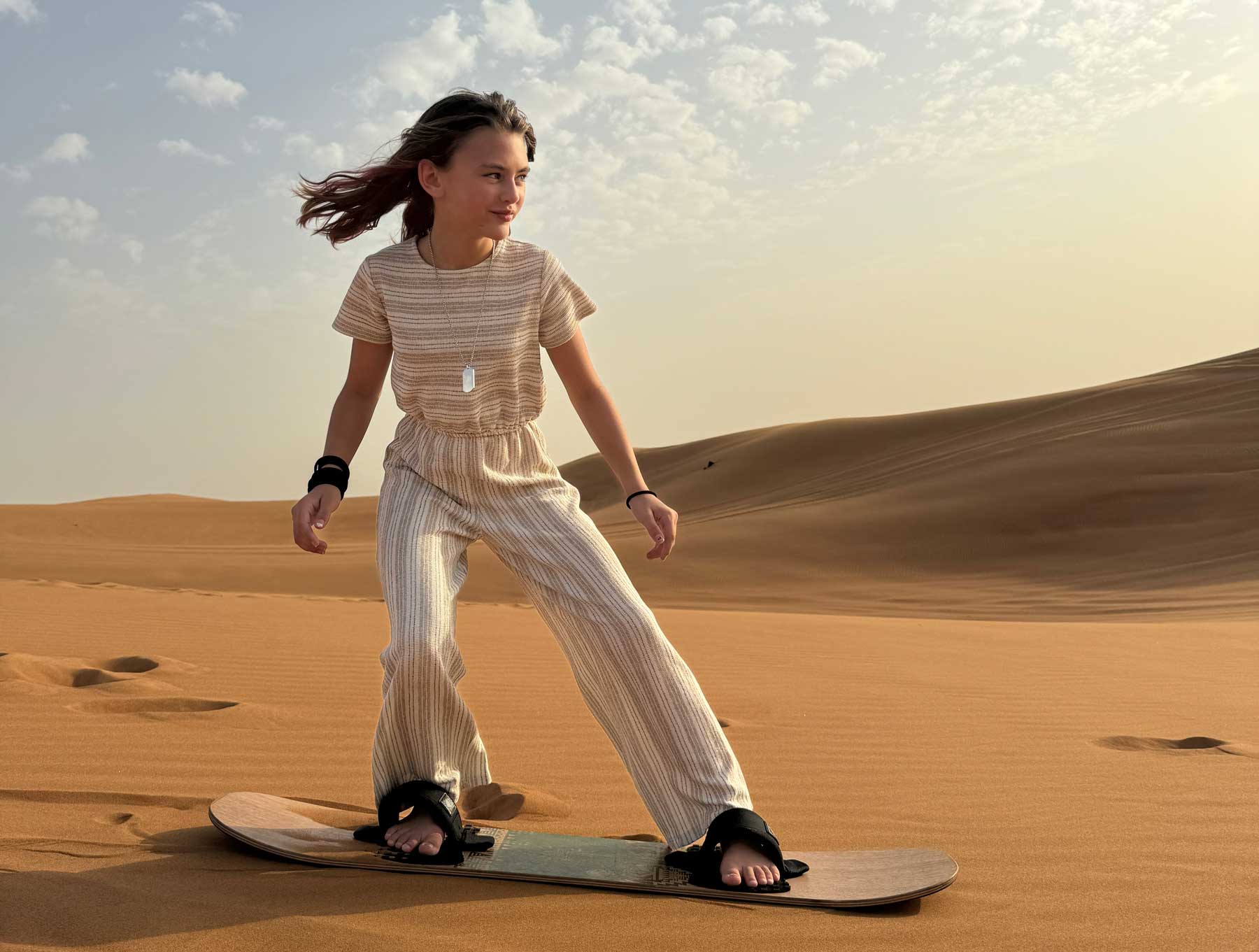 Brooklyn Lockwood snowboards across the sands of Abu Dhabi