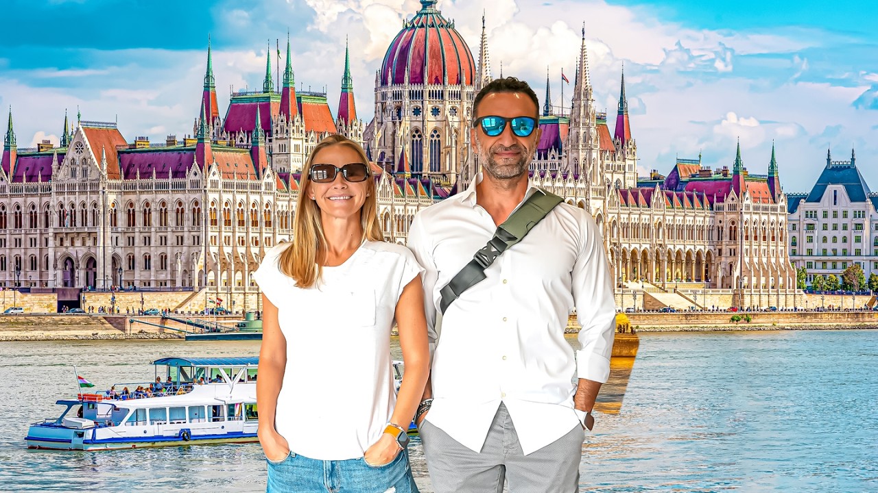 Phil and Erin Lockwood stand in front of the parliament building in Budapest