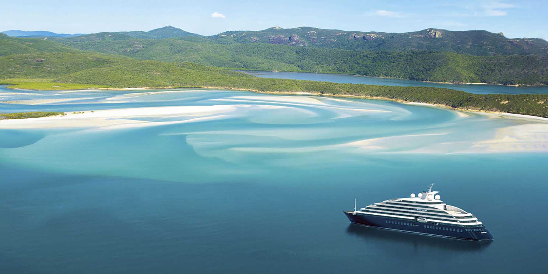 Scenic Eclipse I aerial view in blue waters