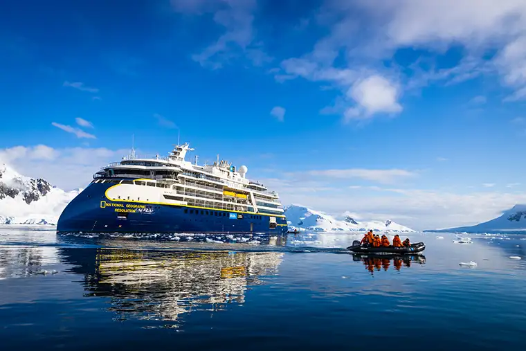 National Geographic Resolution Zodiac alongside ship in polar waters