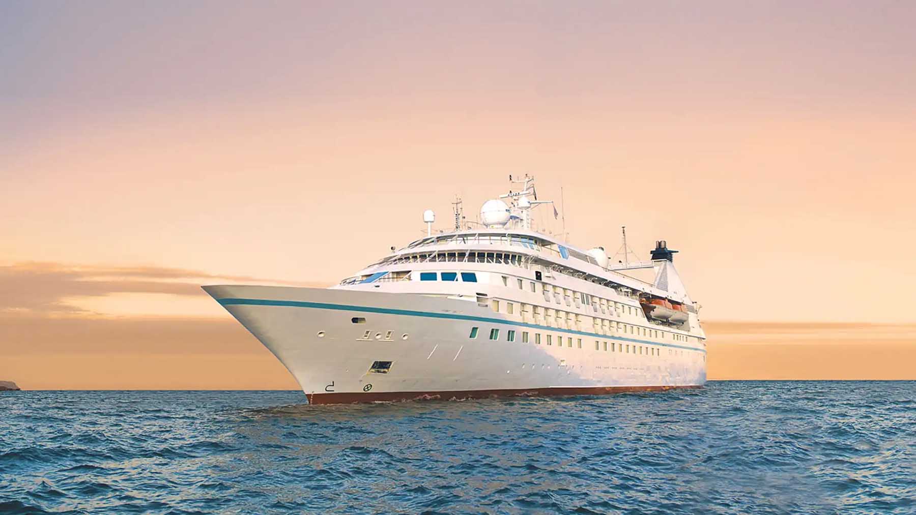 Windstar Star Breeze sailing at golden sunset, main exterior view