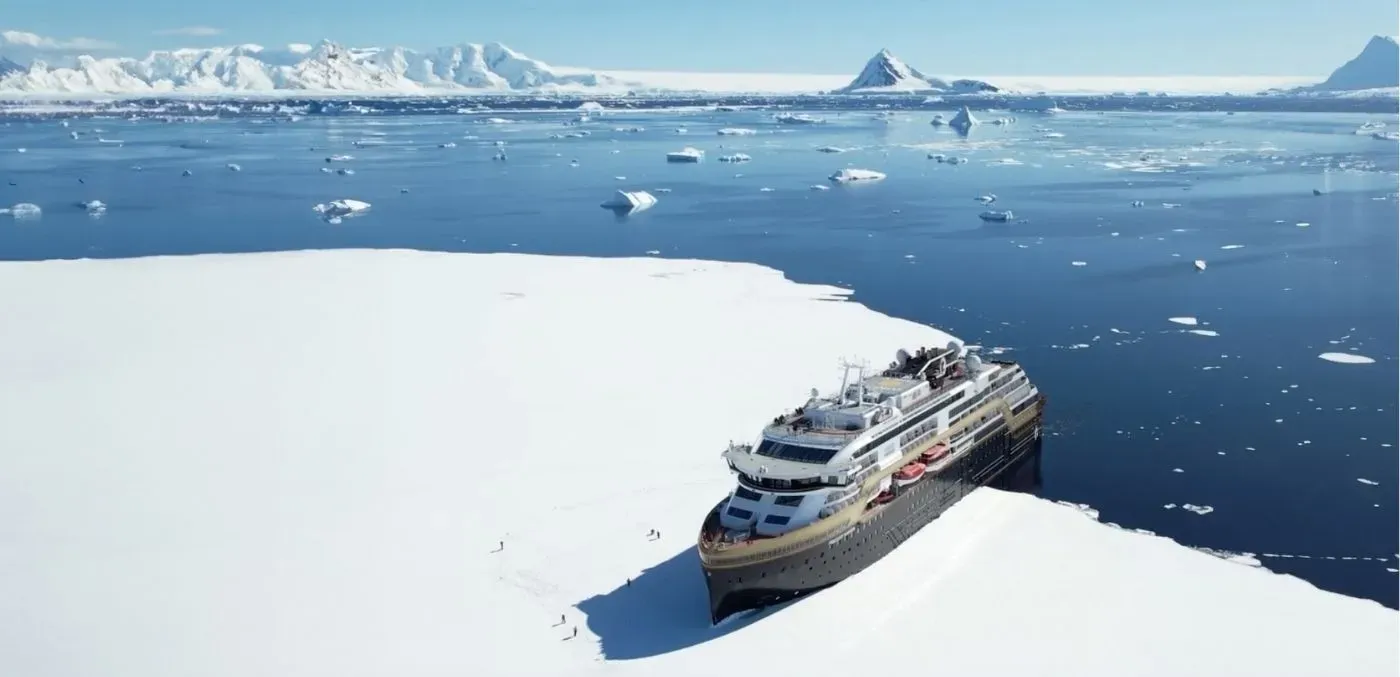 An HX Expeditions cruise ship ice landed in Antarctica