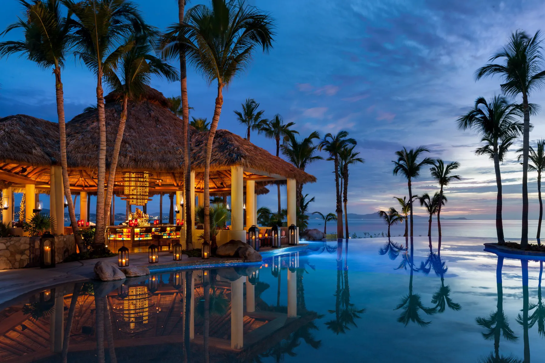 One&Only resort pool at sunset