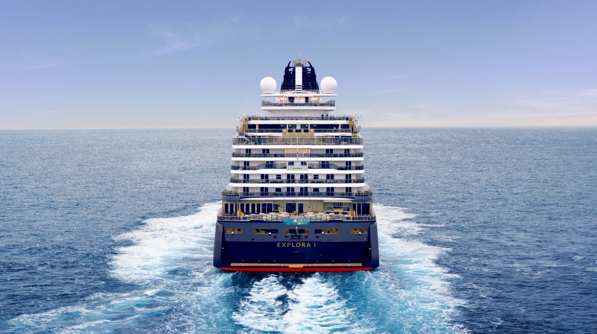 An Explora Journeys cruise ship sails away
