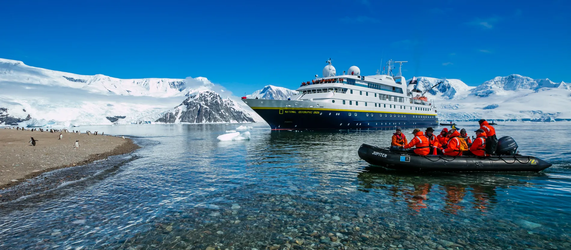Aft loading of zodiacs on a NatGeo-Lindblad expedition cruise ship with zodiac