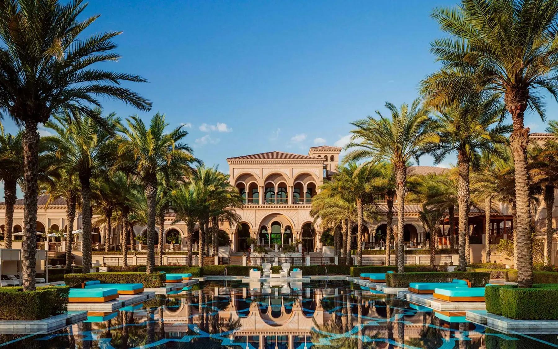 One&Only resort surrounded by palm trees