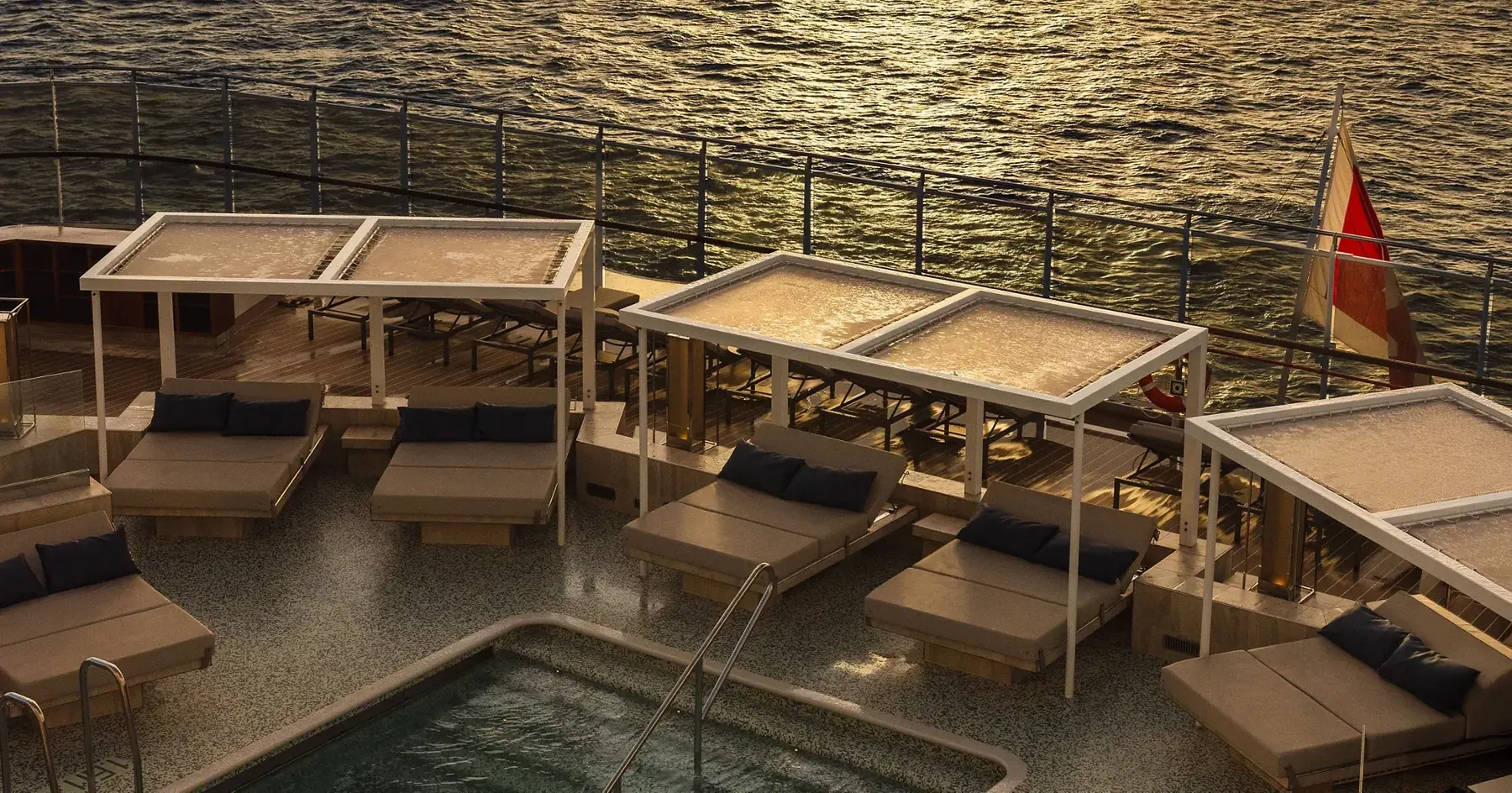 An Explora Journeys cruise ship aft pool deck