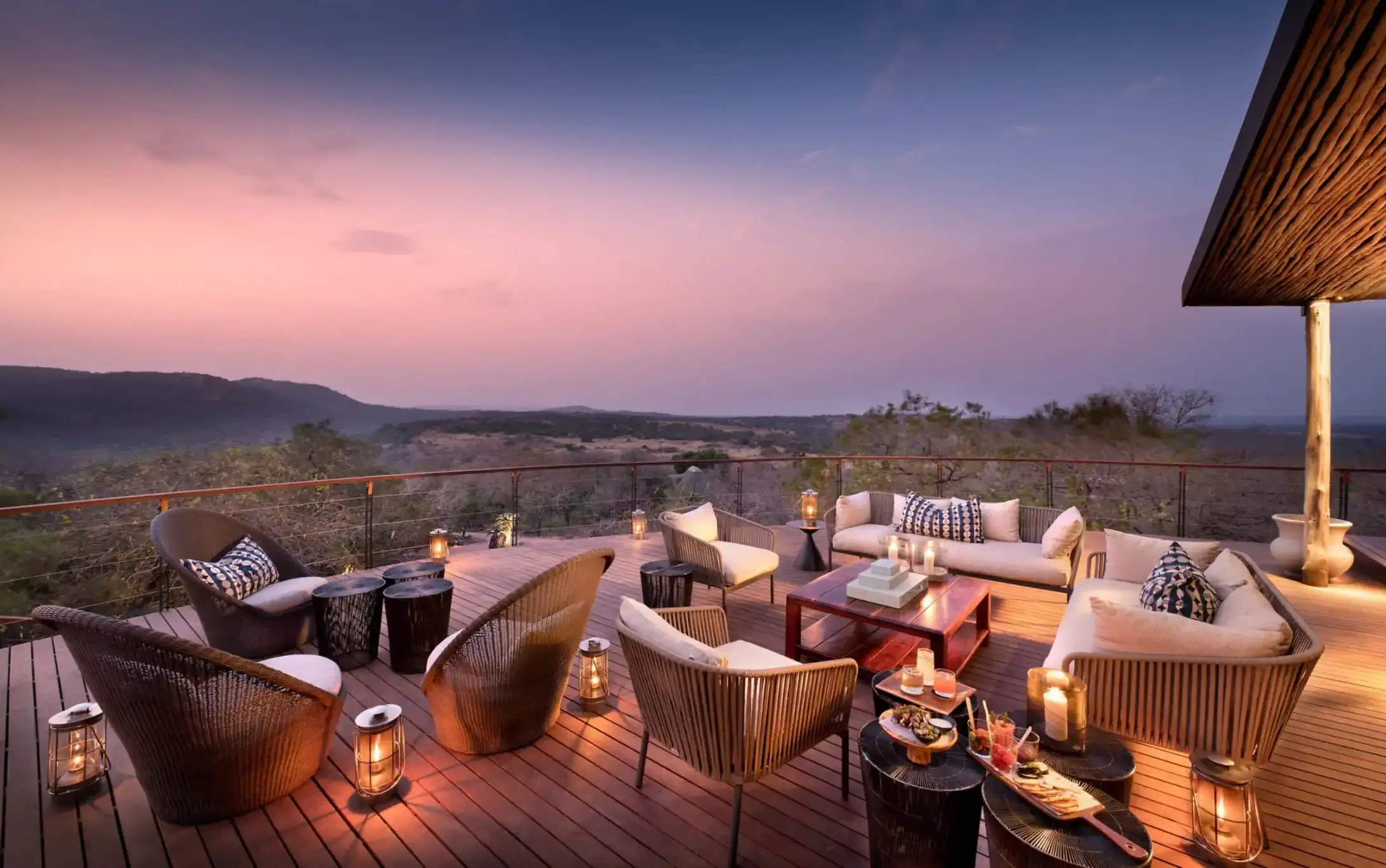 &Beyond Phinda Mountain Lodge deck and view at sunset