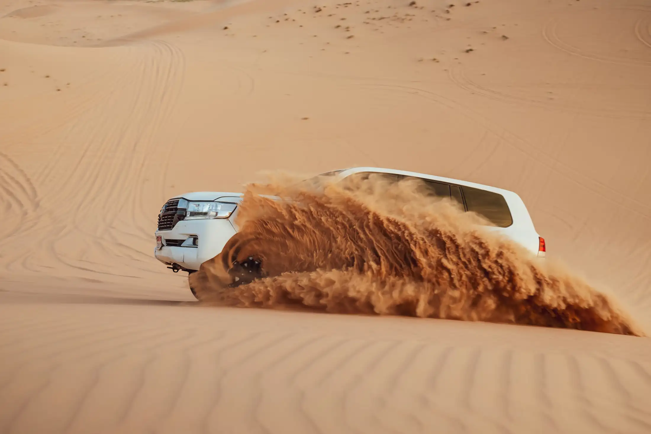 A truck dune bashing in Abu Dhabi