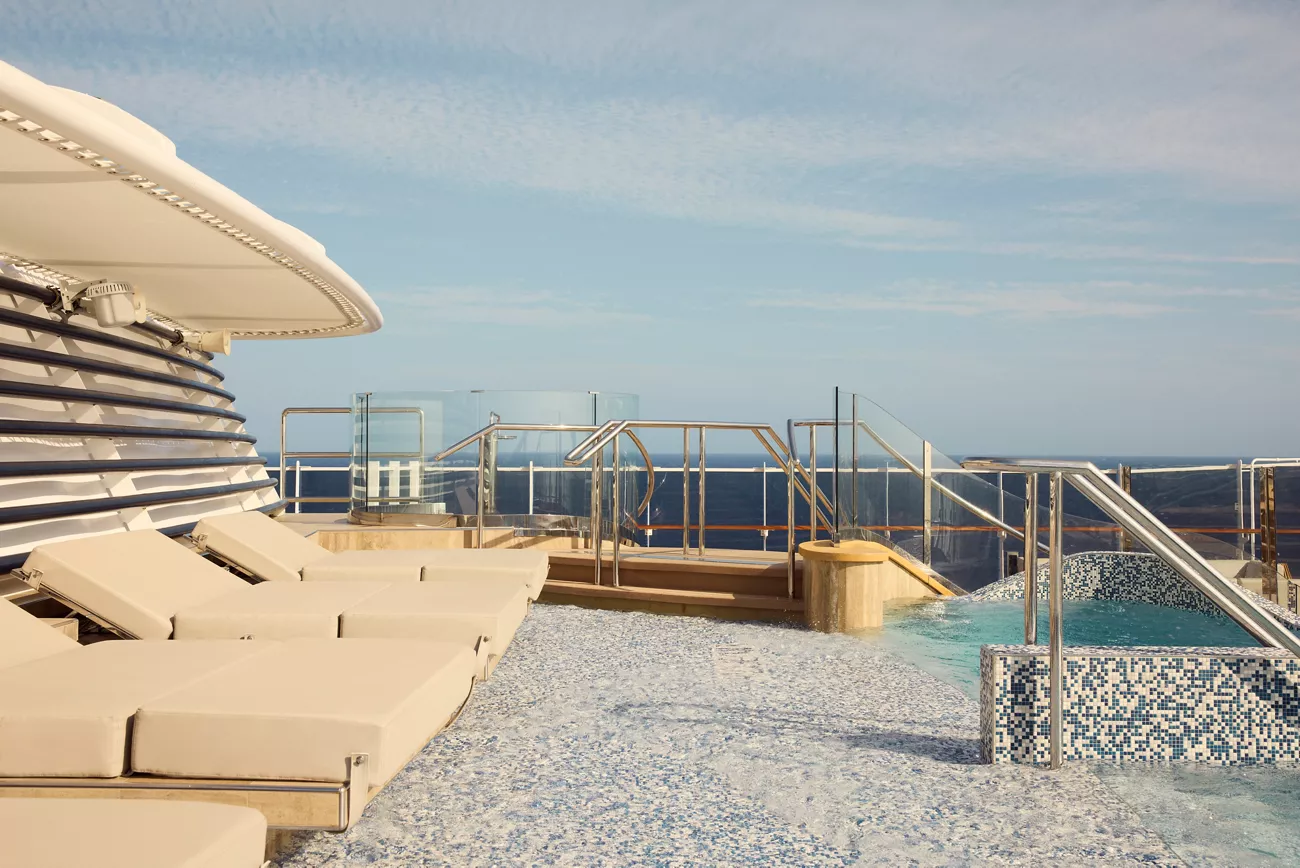 Helios Pool and Bar on deck 12 aboard Explora III, an adults-only outdoor pool deck
