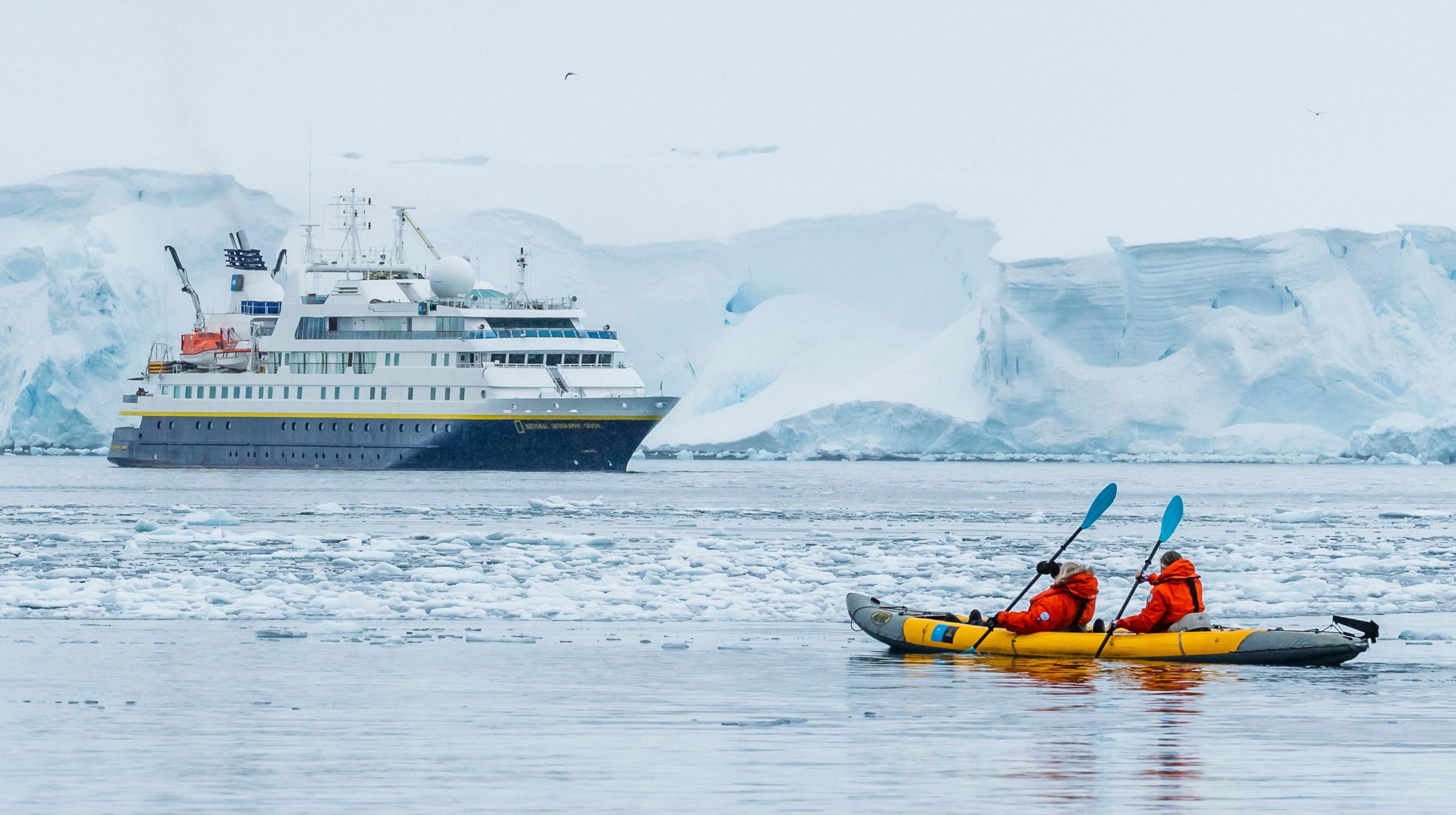 National Geographic Orion anchored in an Antarctic cove