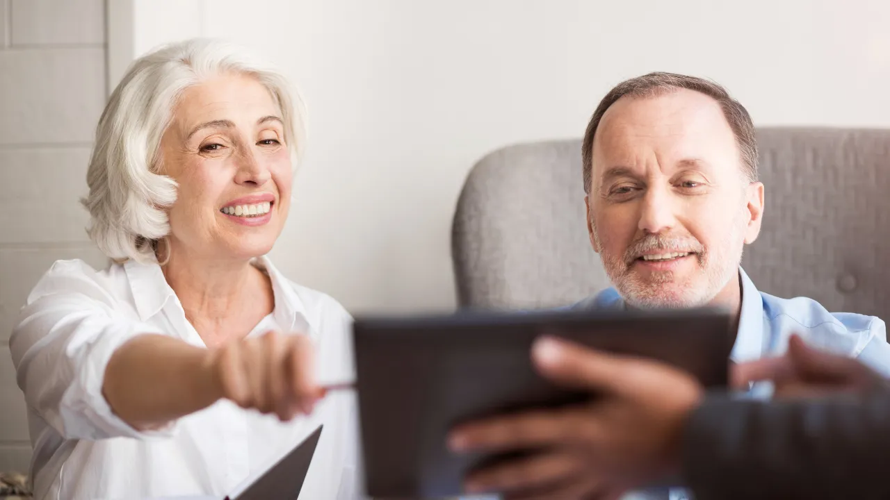 Couple with salesperson