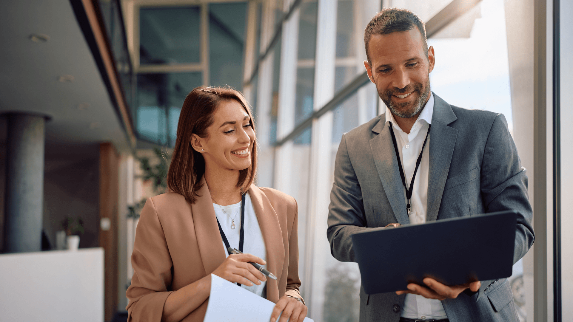 two people reviewing their estate agent crm